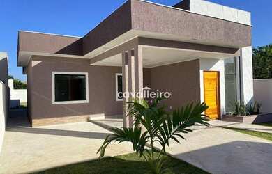 Imagem: A casa possui 3 Dormitórios, 2 Banheiros, 3 Vagas na garagem