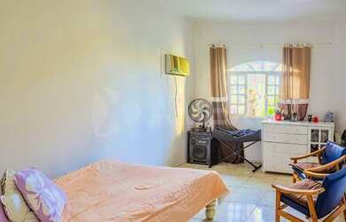 Imagem: A casa possui 3 Dormitórios, 5 Banheiros, 2 Vagas na garagem