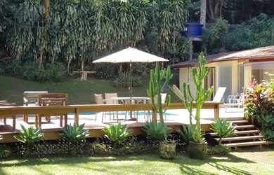 Imagem: A casa possui 5 Dormitórios, 5 Vagas na garagem e está localizado