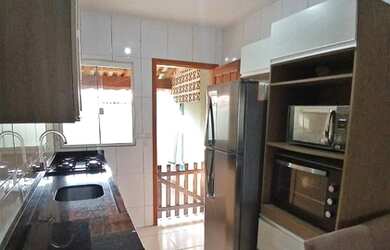 Imagem: A casa possui 2 Dormitórios, 1 Banheiro, 1 Vaga na garagem