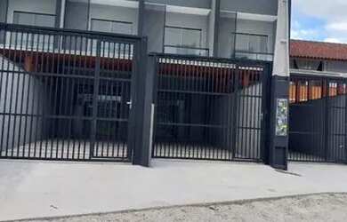 Imagem: A casa possui 2 Dormitórios, 1 Vaga na garagem, 95m² de Área