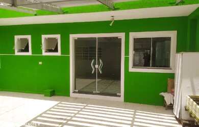 Imagem: A casa possui 4 Dormitórios, 5 Banheiros, 4 Vagas na garagem