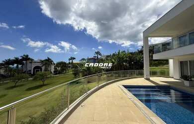 Imagem 3: Luxo, Conforto e Exclusividade: Residência de 6 Suítes com Piscina no Condomínio Horizonta