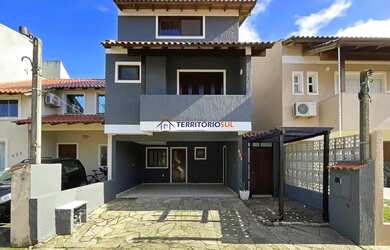 Imagem: A casa possui 3 Dormitórios, 3 Banheiros, 2 Vagas na garagem