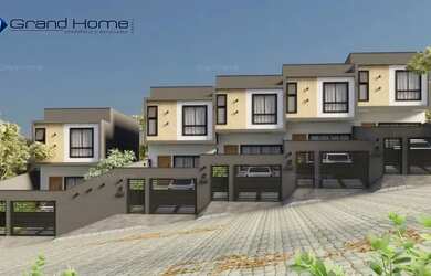 Imagem: A casa possui 3 Dormitórios, 1 Banheiro, 2 Vagas na garagem