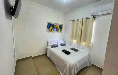 Imagem: A casa possui 2 Dormitórios, 2 Banheiros, 3 Vagas na garagem