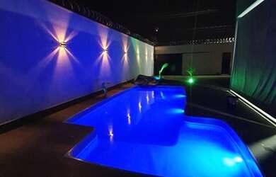 Imagem: A casa possui 2 Dormitórios, 4 Vagas na garagem, Churrasqueira