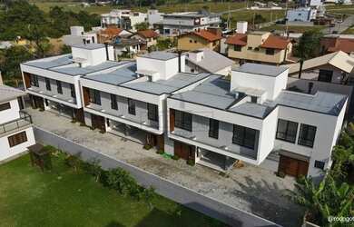 Imagem: A casa em condomínio possui 2 Dormitórios, 3 Banheiros, 1