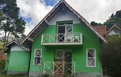 Imagem: A casa possui 3 Dormitórios, 3 Banheiros, 1 Vaga na garagem