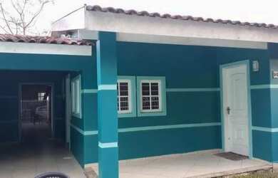 Imagem: A casa possui 2 Dormitórios, 2 Banheiros e 2 Vagas na garagem