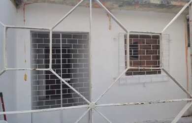 Imagem: A casa possui 2 Dormitórios e 1 Banheiro e está localizado