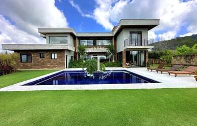 Imagem: A casa em condomínio possui 5 Dormitórios, 5 Banheiros, 5