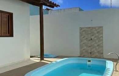 Imagem: A casa à venda possui 2 Dormitórios, 1 Banheiro, 1 Vaga na