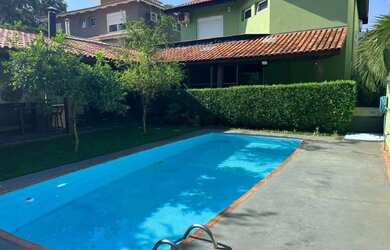 Imagem: A casa em condomínio possui 4 Dormitórios, 2 Banheiros, 4