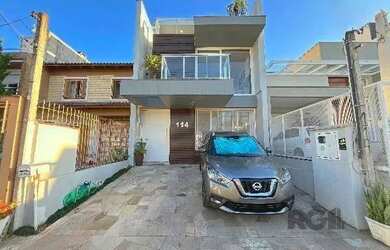 Imagem 3: Casa em Porto Alegre, no bairro Hípica, com 3 dormitório s , e 3 banheiros,...