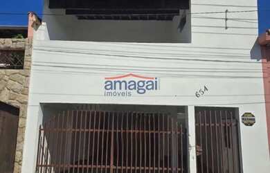 Imagem: A casa possui 2 Dormitórios, 1 Banheiro, 2 Vagas na garagem