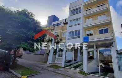 Imagem: O apartamento possui 2 Dormitórios, 1 Banheiro, 2 Vagas na