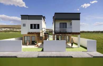 Imagem: A casa possui 4 Dormitórios, 2 Banheiros, 1 Vaga na garagem