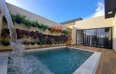 Imagem: A casa possui 3 Dormitórios, 4 Banheiros, 2 Vagas na garagem