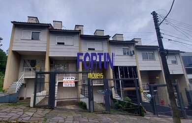 Imagem: A casa possui 2 Dormitórios, 2 Banheiros, 3 Vagas na garagem