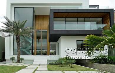 Imagem: A casa em condomínio possui 5 Dormitórios, 5 Banheiros, 5