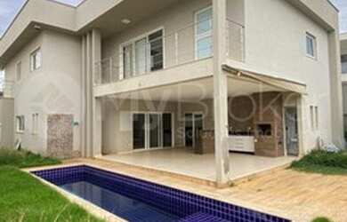 Imagem: A casa em condomínio possui 5 Dormitórios, 5 Banheiros, 4