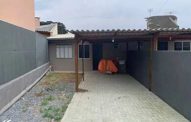 Imagem: A casa possui 1 Dormitório, 1 Banheiro, 1 Vaga na garagem e