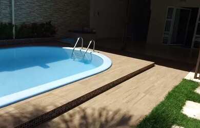 Imagem: A casa possui 3 Dormitórios, 4 Banheiros, 4 Vagas na garagem