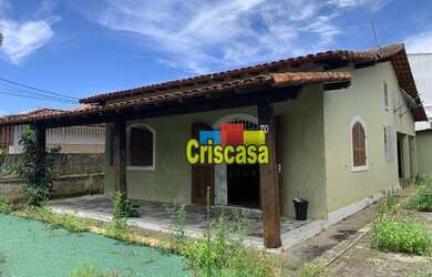 Imagem: A casa possui 4 Dormitórios, 1 Banheiro, 3 Vagas na garagem