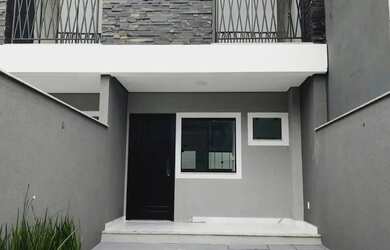 Imagem: A casa possui 2 Dormitórios, 3 Banheiros, 2 Vagas na garagem