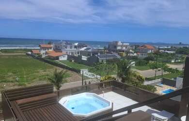 Imagem 4: Casa de veraneio. Churrasqueira, Acomodam 12 pessoas, 4 Vagas na garageme4...