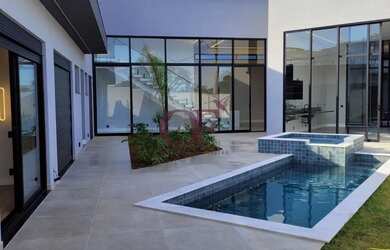 Imagem: A casa em condomínio possui 4 Dormitórios, 5 Banheiros, 5