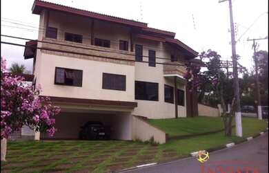 Imagem: A casa em condomínio possui 4 Dormitórios, 2 Banheiros, 4