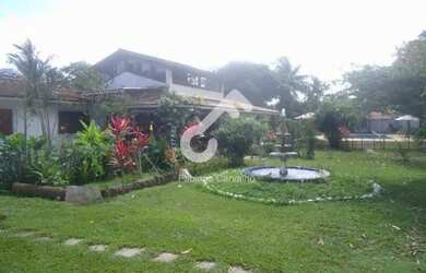 Imagem: A casa possui 4 Dormitórios, 1 Banheiro, 2 Vagas na garagem