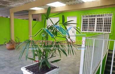 Imagem: A casa possui 3 Dormitórios, 2 Banheiros, 2 Vagas na garagem