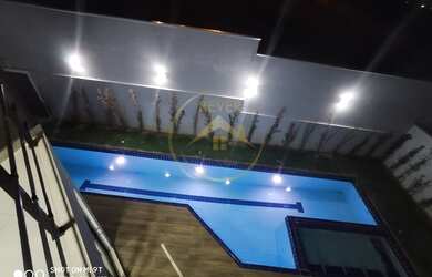 Imagem: A casa em condomínio possui 5 Dormitórios, 5 Banheiros, 4