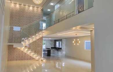 Imagem: A casa em condomínio possui 5 Dormitórios, 5 Banheiros, 2