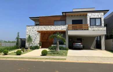 Imagem: A casa em condomínio possui 4 Dormitórios, 5 Banheiros, 4