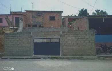 Imagem: A casa possui 2 Dormitórios, 1 Banheiro, 1 Vaga na garagem