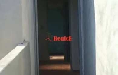 Imagem: A casa possui 1 Dormitório, 1 Banheiro, 1 Vaga na garagem