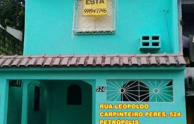 Imagem: A casa possui 3 Dormitórios, 2 Banheiros, 1 Vaga na garagem