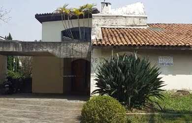 Imagem: A casa possui 3 Dormitórios, 4 Banheiros, 4 Vagas na garagem