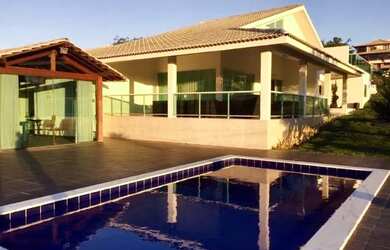 Imagem: A casa possui 5 Dormitórios, 5 Vagas na garagem e está localizado