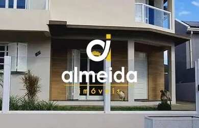 Imagem: A casa possui 4 Dormitórios, 4 Banheiros, 4 Vagas na garagem