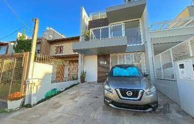 Imagem 2: Casa em Porto Alegre, no bairro Hípica, com 3 dormitório s , e 3 banheiros,...