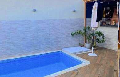 Imagem: A casa possui 2 Dormitórios, 2 Banheiros, 2 Vagas na garagem