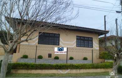 Imagem: A casa possui 5 Dormitórios, 3 Banheiros, 5 Vagas na garagem