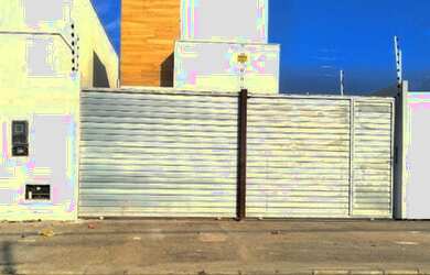 Imagem: A casa possui 3 Dormitórios, 2 Banheiros, 4 Vagas na garagem