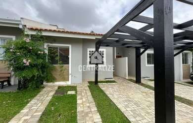 Imagem: A casa em condomínio possui 3 Dormitórios, 2 Banheiros, 2