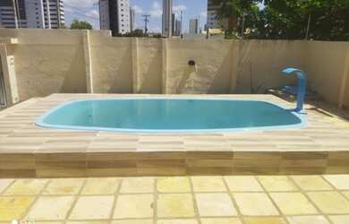 Imagem: A casa possui 3 Dormitórios, 5 Vagas na garagem e está localizado